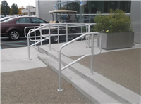 Fence Gallery Photo - Aluminum Pipe Rail at Step for a Car Dealership.jpg